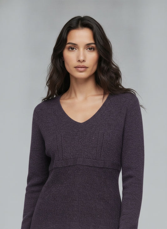 Close-up of the model wearing Fjólublá ullarpeysa (M/L)
