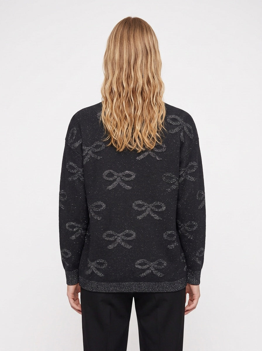 Svört vintage glimmerpeysa með slaufum (L)